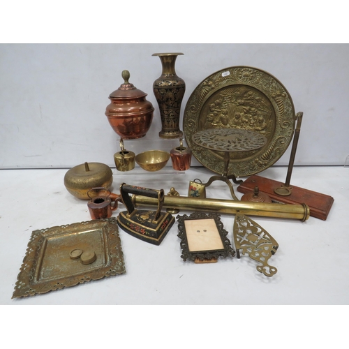 939 - Mixed brass and copper lot including trivots, copper pots and a cast iron etc.