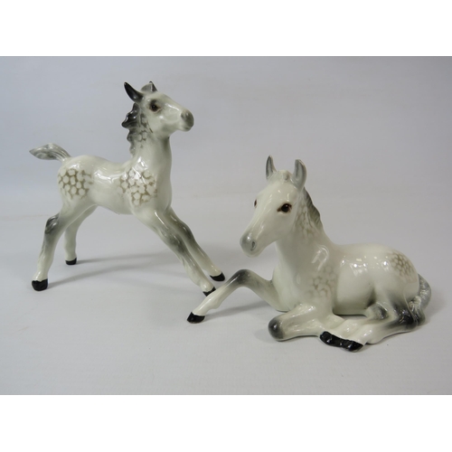 203 - 2 Beswick grey foal figurines.