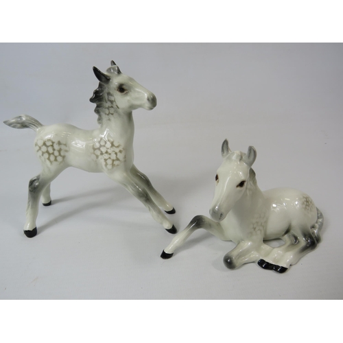 203 - 2 Beswick grey foal figurines.