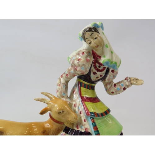 205 - A rare Beswick figurine of a lady and a goat, approx 15cm tall, 17cm long. Model no 1234.