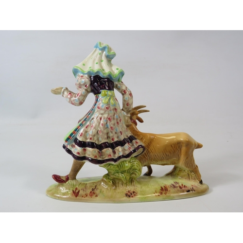 205 - A rare Beswick figurine of a lady and a goat, approx 15cm tall, 17cm long. Model no 1234.