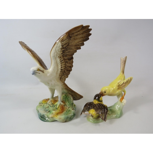 206 - Sylvac Osprey figurine (approx 22cm tall) and a Goebel Canary feeding a chick figurine.