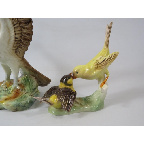 206 - Sylvac Osprey figurine (approx 22cm tall) and a Goebel Canary feeding a chick figurine.