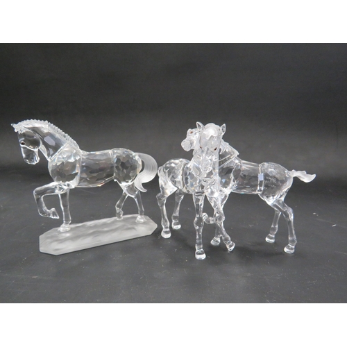 211 - 2 Swarovski crystal horse figurines, Stallion and pair of foals.