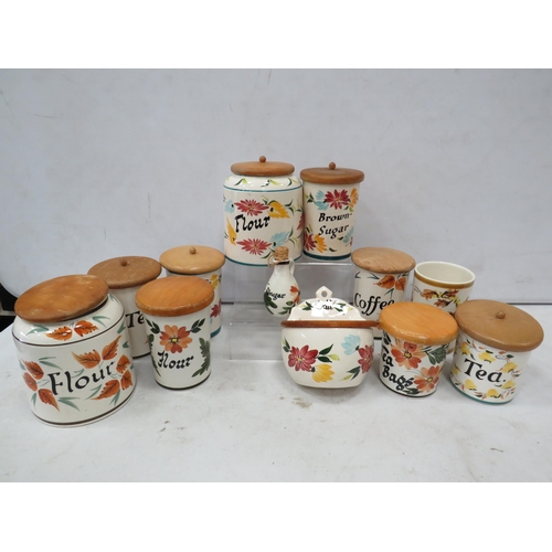 955 - Large selection of Toni Raymond pottery storage jars.