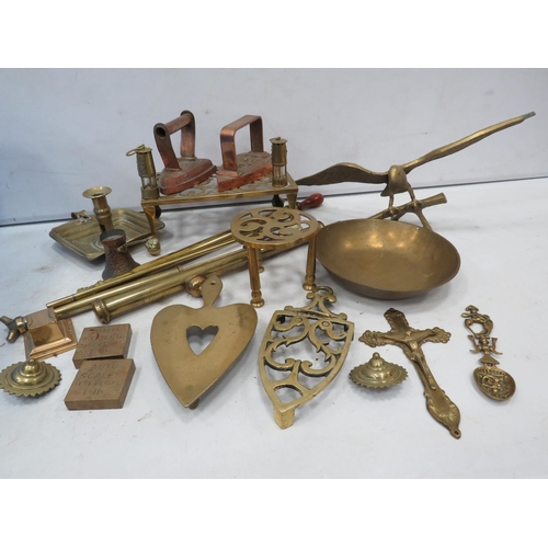 966 - Good selection of brass items, trivots, pumps, ornaments and two copper cast irons.