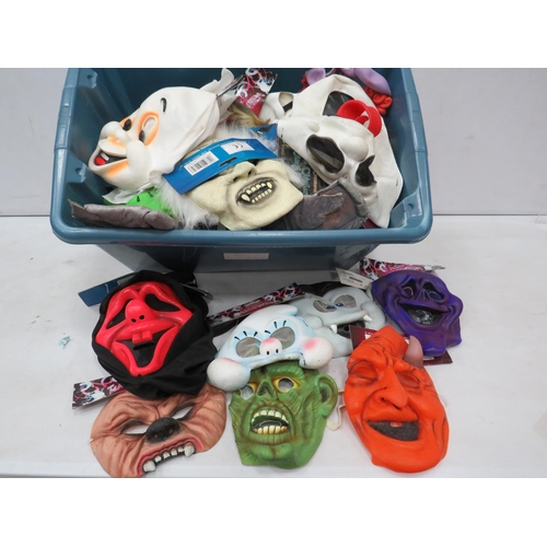 967 - Tub full of Halloween masks.