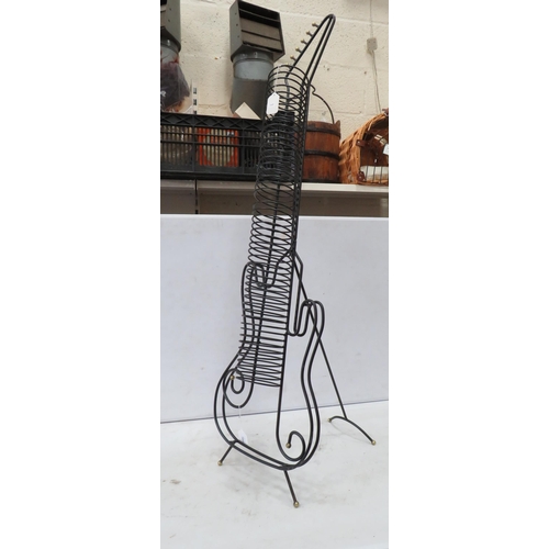 999 - Guitar shaped CD rack, Approx 52 inches tall.