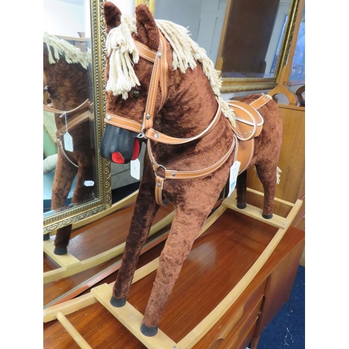 101 - Well made plush rocking horse by Nubee with leather tack and plush fur body in excellent contdition.... 