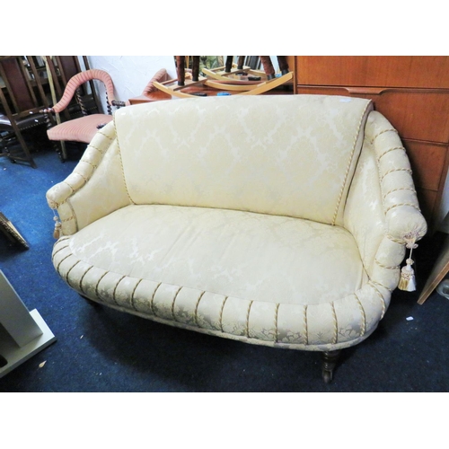 103 - Nicely upholstered Early 20th Century boudoir style two seater settee with Ivory fabric and tassles.... 