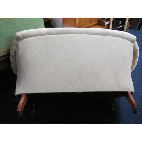 103 - Nicely upholstered Early 20th Century boudoir style two seater settee with Ivory fabric and tassles.... 