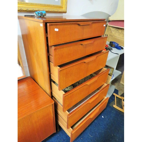 104 - Mid 20th Century stylish Teak Bedroom chest of six drawers which measures approx H:49 x W:25 x D:16 ... 