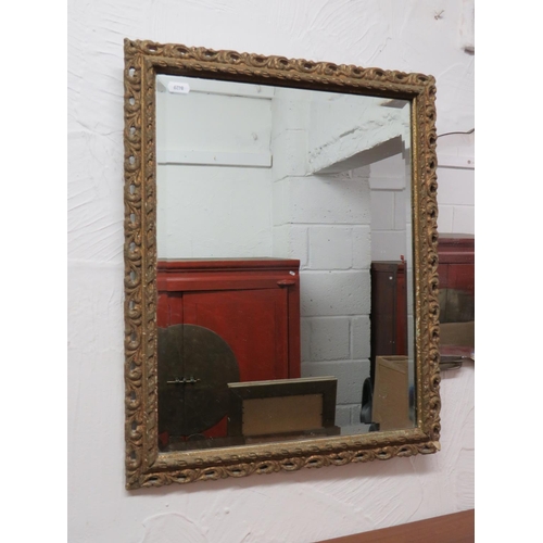 107 - Old Gilt framed bevelled glass mirror which measures approx 16 x 21 inches. See photos.