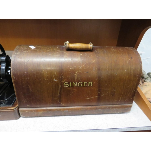 108 - Vintage Singer Sewing Machine,  Model 128K with wooden cover, appears to be in working order .   See... 