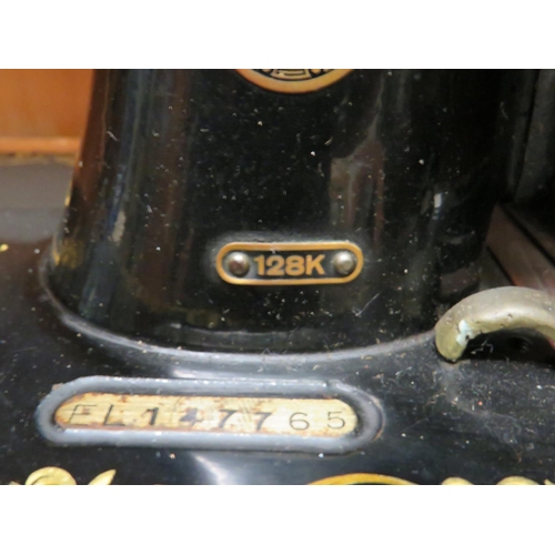 108 - Vintage Singer Sewing Machine,  Model 128K with wooden cover, appears to be in working order .   See... 