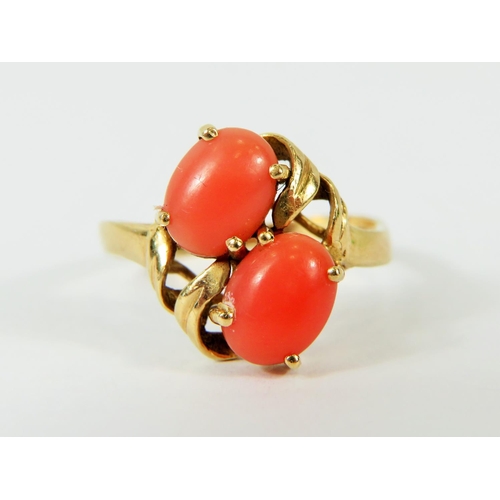 114 - 14ct Yellow Gold ring set with twin coral ovals..  Finger size 'M-5'   2.7 g