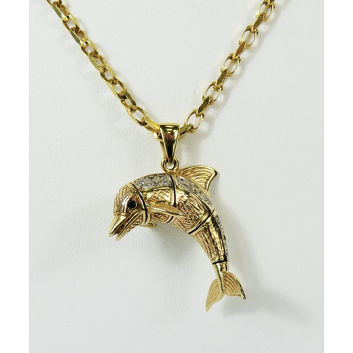 122 - 9ct Yellow Gold Articulated pendant as a leaping Dolphin set with multiple clear gemstones, hung on ... 