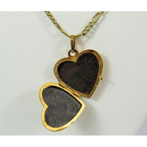 124 - 9ct Yellow Gold Heart Shaped Locket with Scrolled front and rear, set on a 20 inch, 9ct Yellow Gold ... 