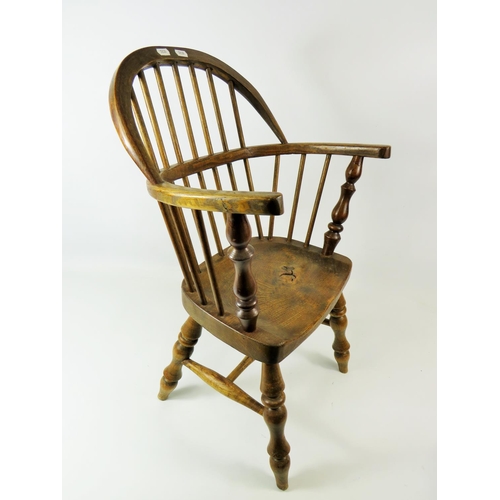 90 - Well made Oak Childs size Windsor stick chair with turned legs.  Seat height 11 inches,  Height to b... 