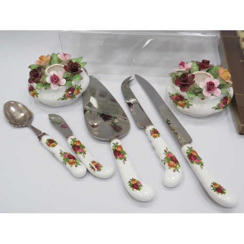 219 - Selection of Royal Albert Old Country roses including place settings, napkin rings, cutlery etc.