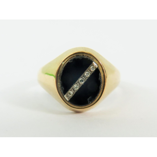 130 - 9ct Yellow Gold Gents ring set with Black Onyx and a stripe of small Diamonds.  Finger size 'U'  4.0... 