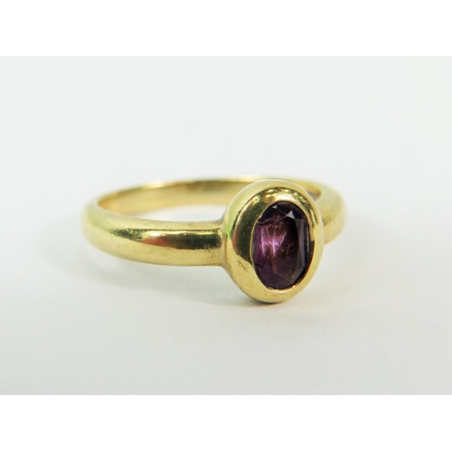 138 - 9ct Yellow Gold Oval Amethyst set ring.   Finger size 'P'  2.9g