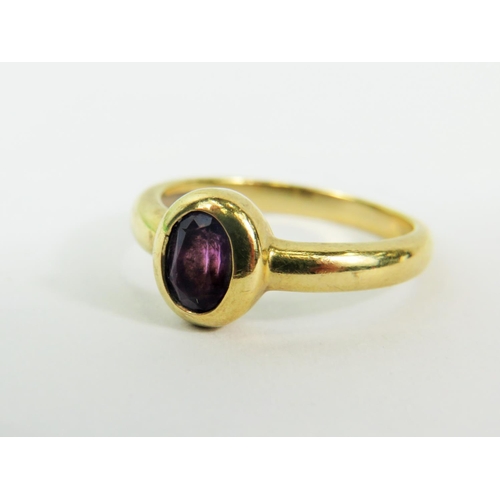 138 - 9ct Yellow Gold Oval Amethyst set ring.   Finger size 'P'  2.9g