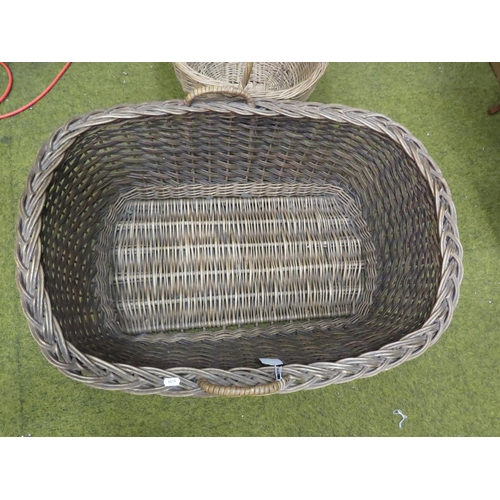 254 - Large vintage wicker moses basket plus a small wicker carry basket.