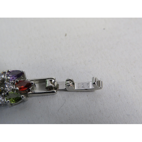 256 - 925 Silver multi gem bracelet.