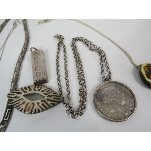 263 - Sterling silver necklace and pendant lot including a mounted George III 3 shillin 1813 bank token. T... 