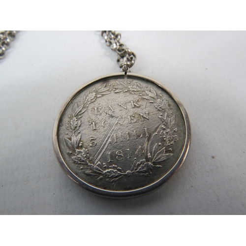 263 - Sterling silver necklace and pendant lot including a mounted George III 3 shillin 1813 bank token. T... 