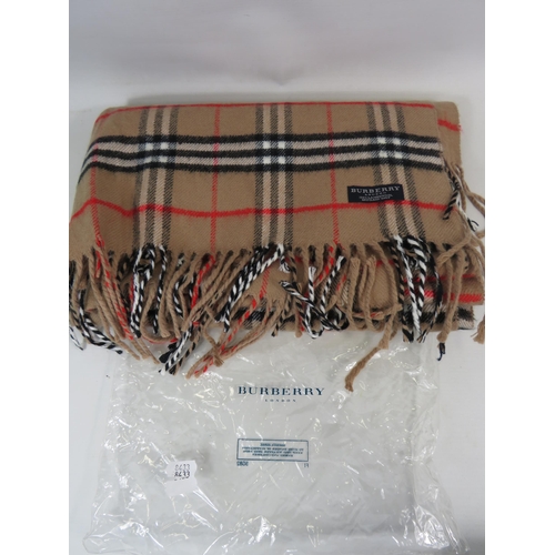 298 - Burberry scarf with original bag.