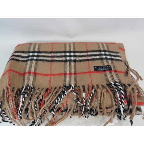 298 - Burberry scarf with original bag.