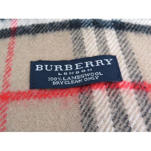 298 - Burberry scarf with original bag.