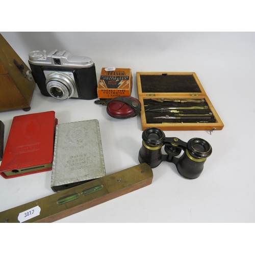 300 - Mixed collectables lot including a metronome, Cameras, cast irons etc.