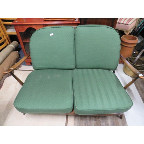 519 - Mid 20th Century Stick back Ercol two seat settee in original unrestored condition.. Seat height 15 ... 