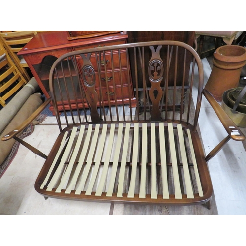 519 - Mid 20th Century Stick back Ercol two seat settee in original unrestored condition.. Seat height 15 ... 