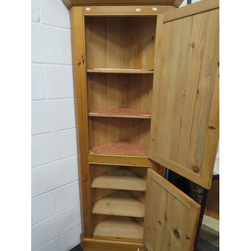 540 - Large Solid pine corner cabinet with top and bottom doors reavealing fixed pine shelves.   H:78 x W:... 