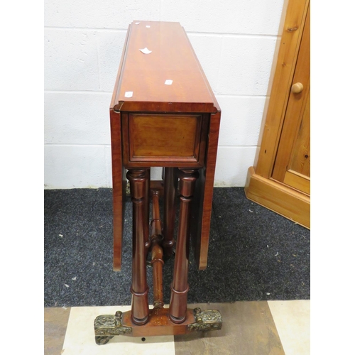 542 - Well made Early 20th Century, Edwardian era drop leaf space saver table. Raised on original castors ... 