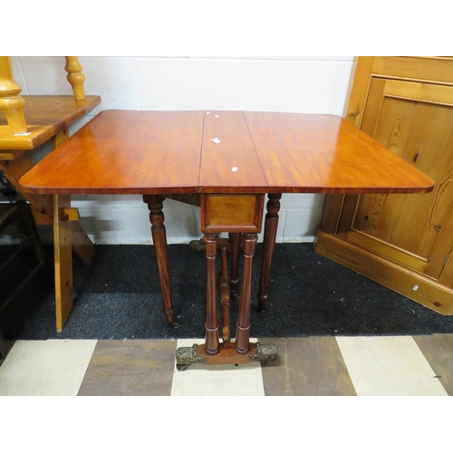 542 - Well made Early 20th Century, Edwardian era drop leaf space saver table. Raised on original castors ... 