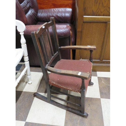 552 - Small Edwardian era, Childs or Dolls rocking chair. In good order apart from worn seat. Would benefi... 