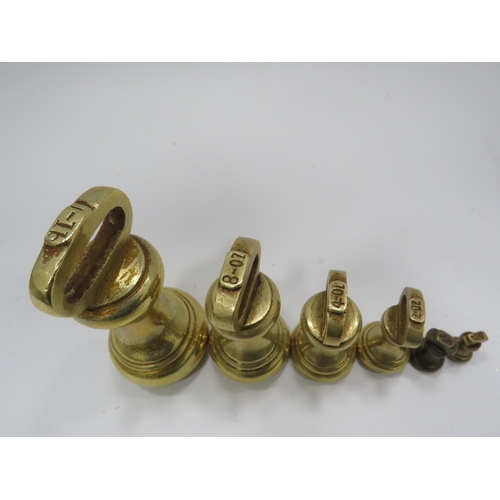 311 - Set of brass bell weights.