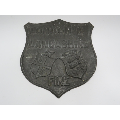 313 - Vintage London and Lancashire fire lead shield shaped sign, 9