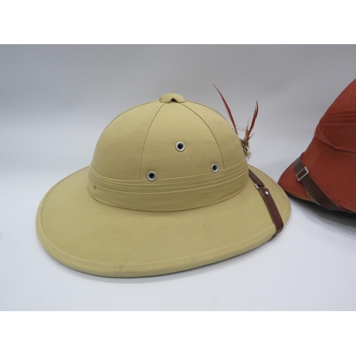 335 - A pith helmet and a pith hat.