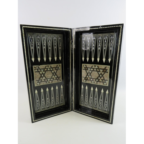 342 - Egyptian folding Chess/backgammon board lacquered with mother of pearl inlay.