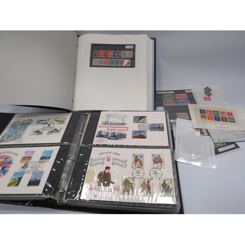 347 - Part filled album of mint stamps and a folder full of First day covers.