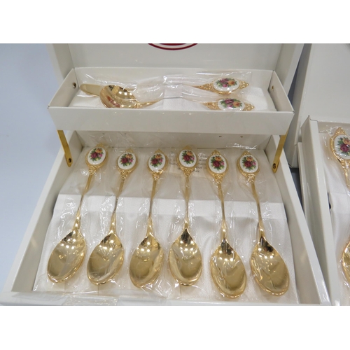 402 - Royal Albert Old Country roses gold plated cake fork set and teaspoon set unused in boxes.