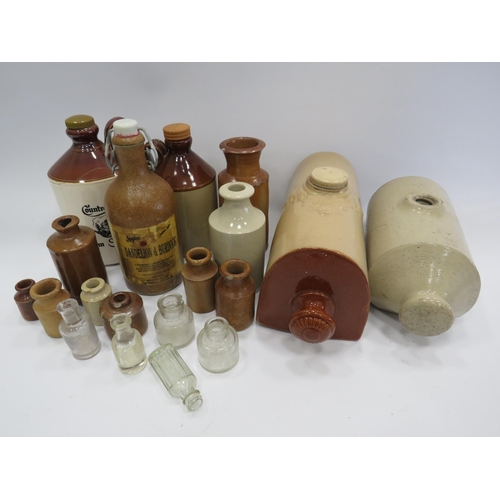 445 - Selection of stoneware bottles & pots, bed warmers and small glass bottles.