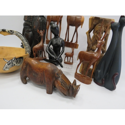 452 - Wooden ware lot to include a wall plaque, animal sculptures, Zebra bowl etc.