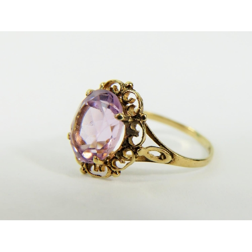 156 - 9ct Yellow Gold ring set with an pale Amethyst oval.   Finger size 'K'   1.7g total.   See photo.